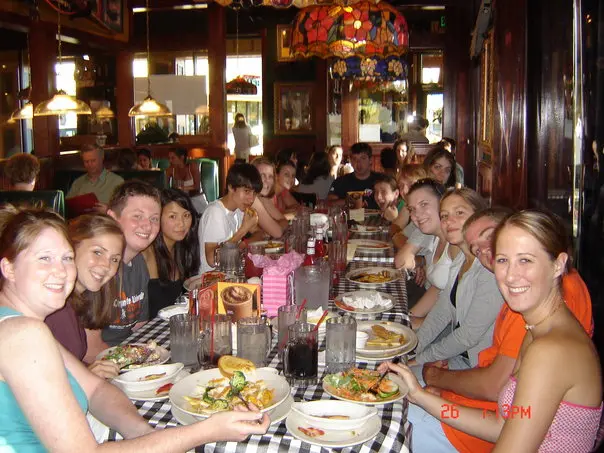 Staff eating and drinking at a restaurant 